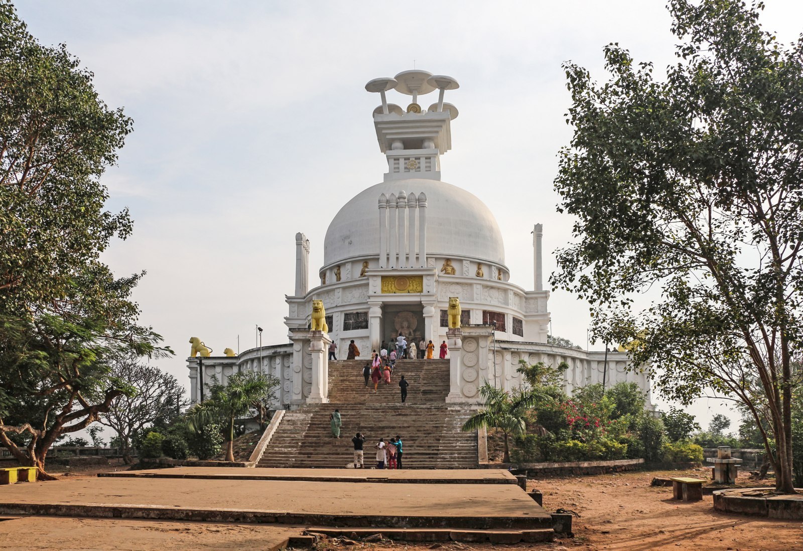 The white Shanti Stupa above a flight of steps at Dhauli.