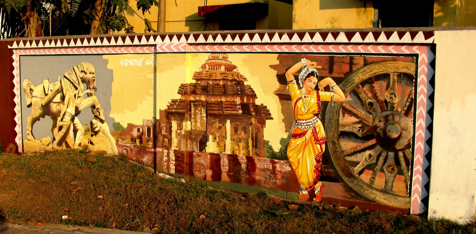 Temple, wheel and dancer
